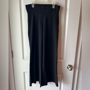Betabrand black flare leg yoga pants. Medium petite